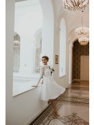 Biele midi bezchrbtové šaty