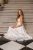 Evelin - saténové maxi šaty s volánovým lemom a  hrubými ramienkami, v bielej farbe
